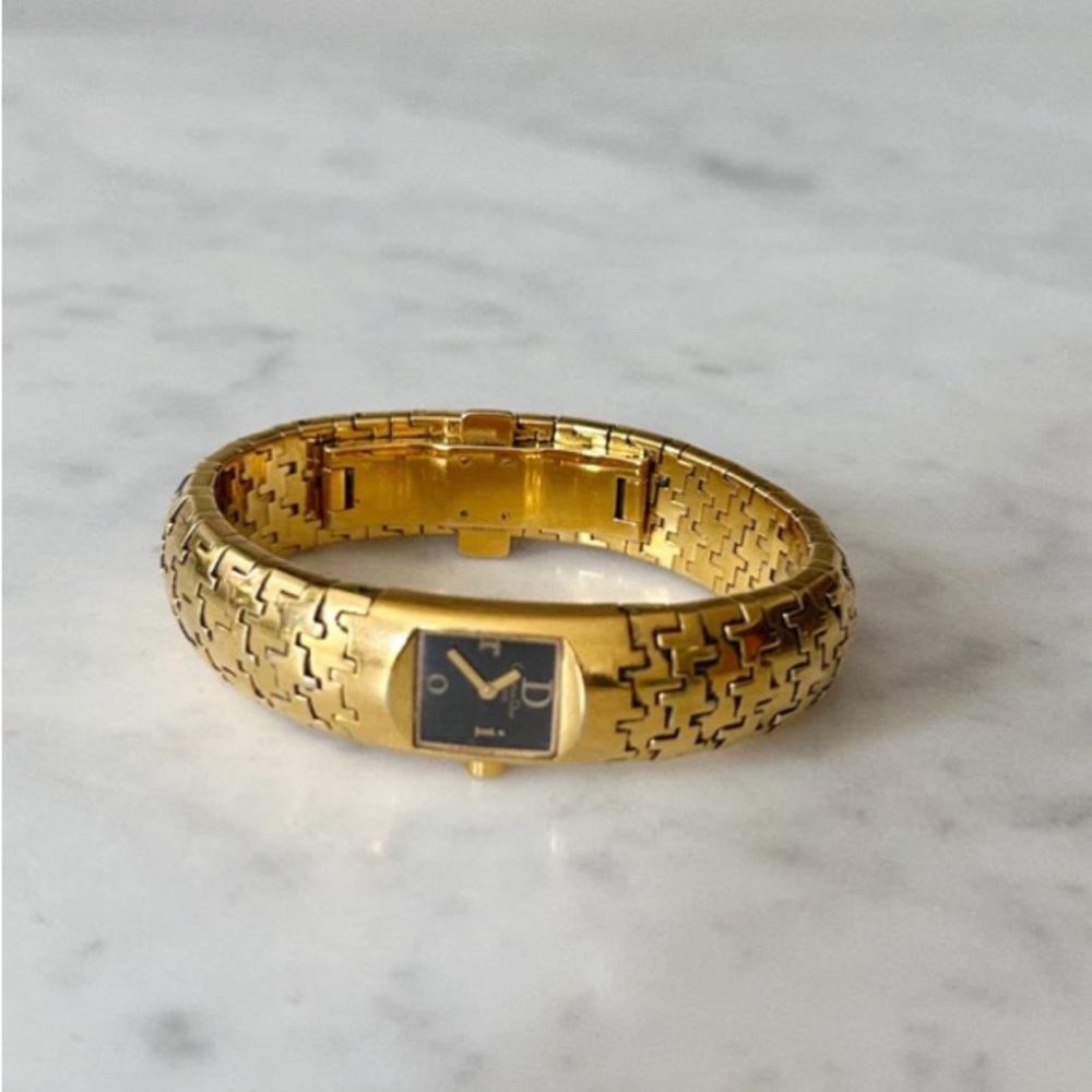 Authentic vintage Christian Dior  watch gold with black inlaid face